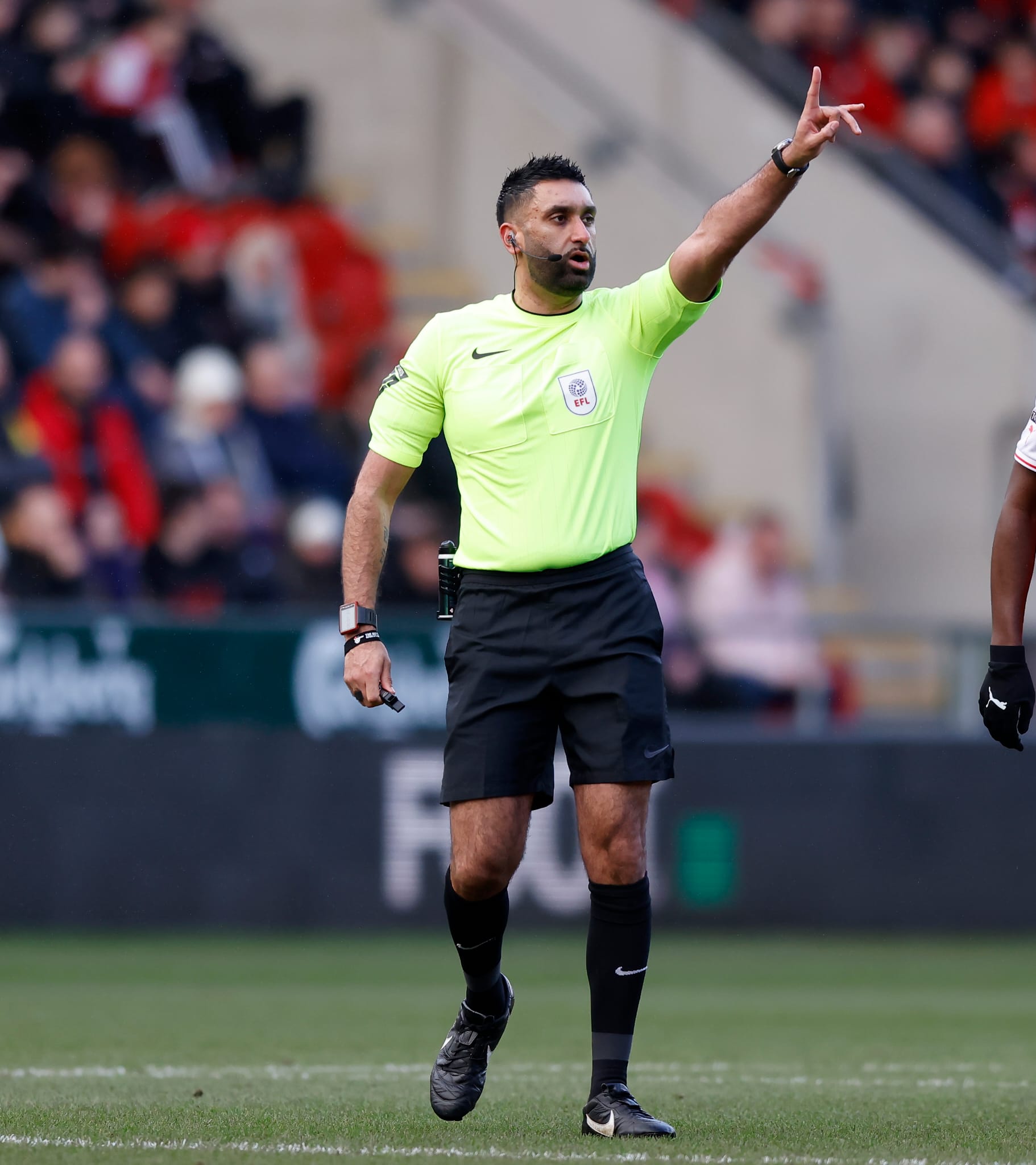 Sunny Singh Gill signalling during a match